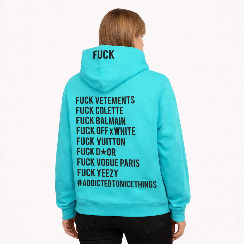 Sweat à capuche turquoise ATNT Paris, vue de dos, typographie noire provocatrice avec références mode et hashtag « Addicted to Nice Things », style streetwear
